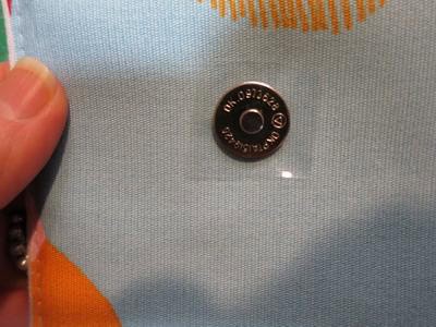 Push the snap through the hole