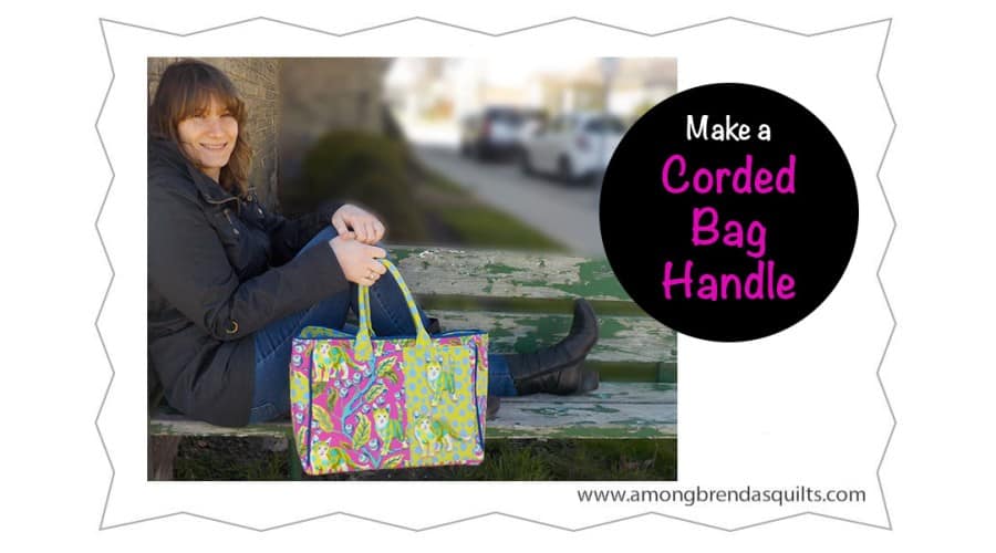 Woman sitting on bench holding a bag with a corded handle