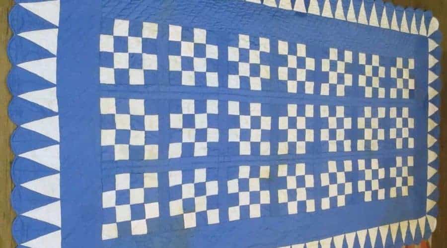 A repaired quilt that was damaged in a tragic fire