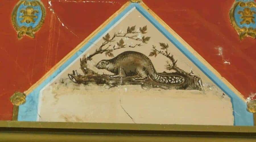 A hand painted Beaver detail on a wall.