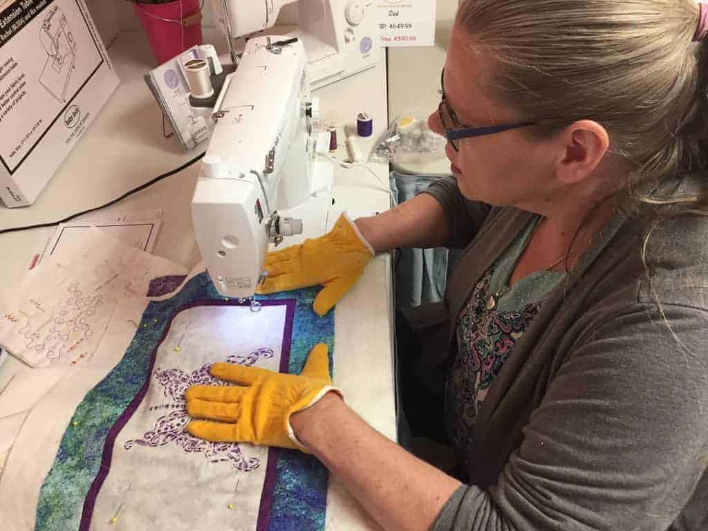Kelley sewing on Accomplish sewing machine