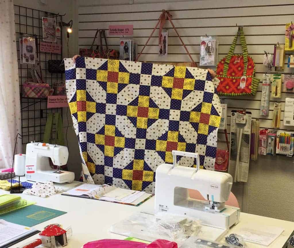 Merle Siebec uses a classic French colorway for her lap quilt. 