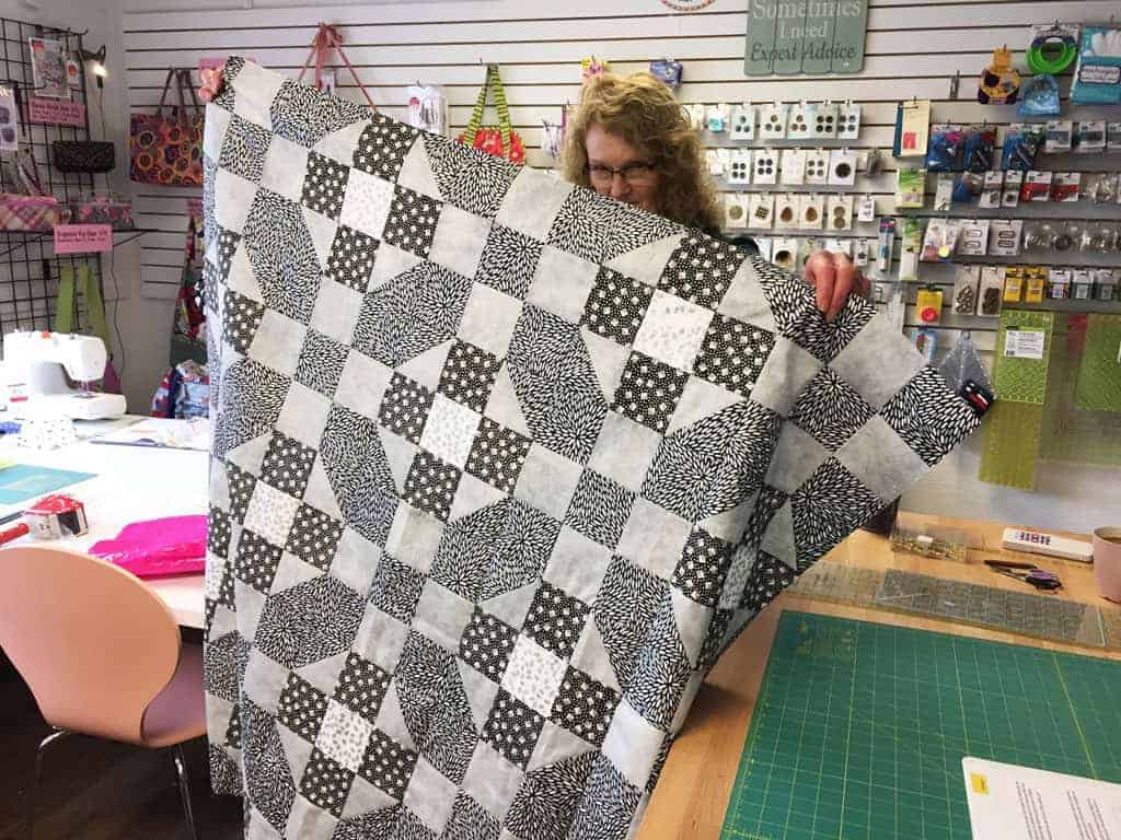 Val Scott 's black, white, grey and silver quilt.