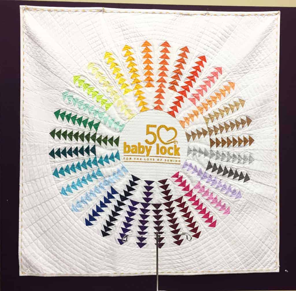 Baby Lock logo on a quilt