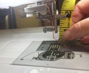 Sewing machine with high shank