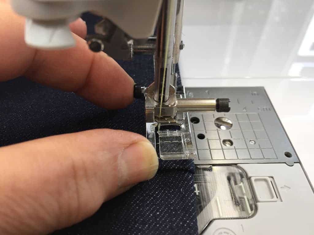 Leveler button on sewing foot