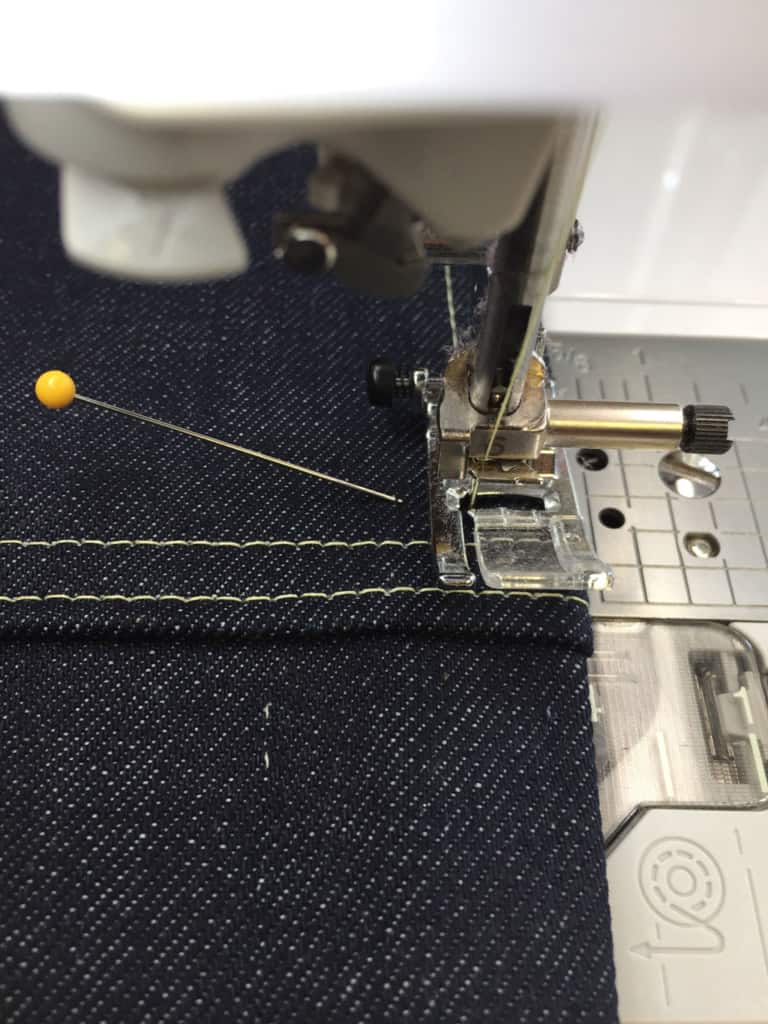 Demonstration of how to sew with heavy fabric: top of the 'hill'.