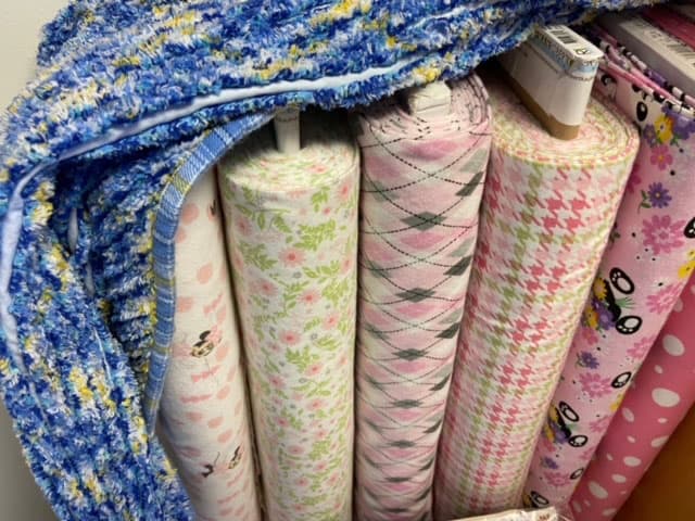 Flannel fabric with a chenille quilt on top