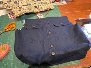 Partially sewn bag made from upcycled fabric