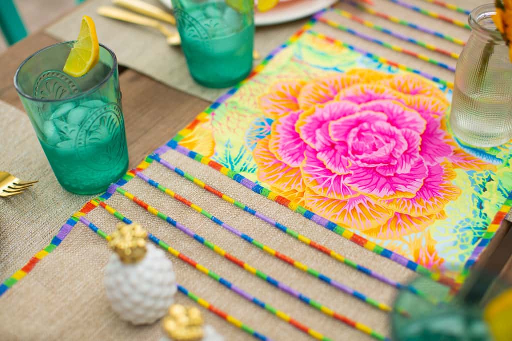 A colourful satin stitch on table decor.