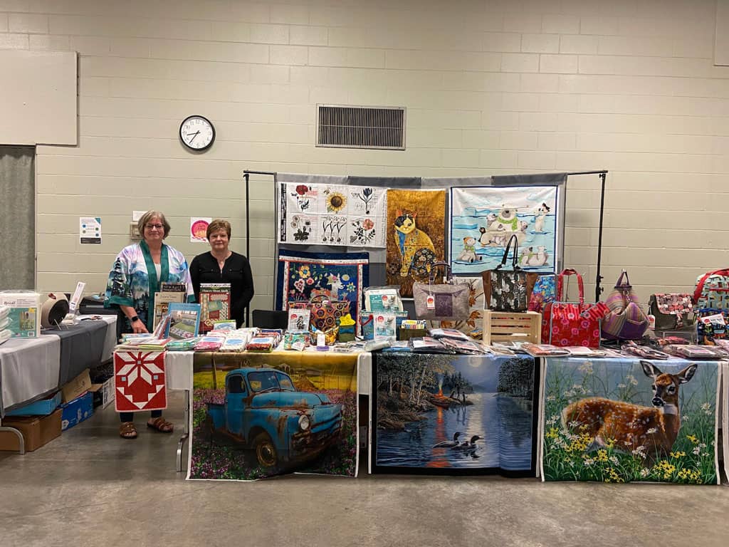 Among Brenda's Quilts & Bags booth at the Huron Perth Quilters Guild