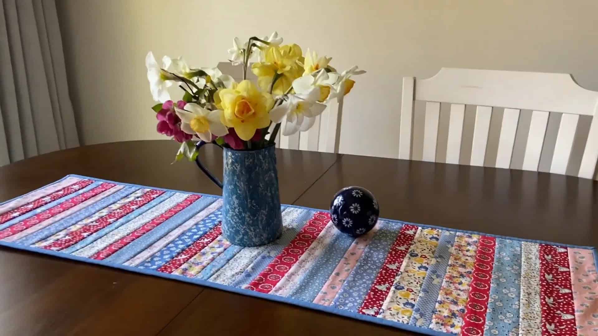 Completed quilt-as-you-go table runner showcasing its design