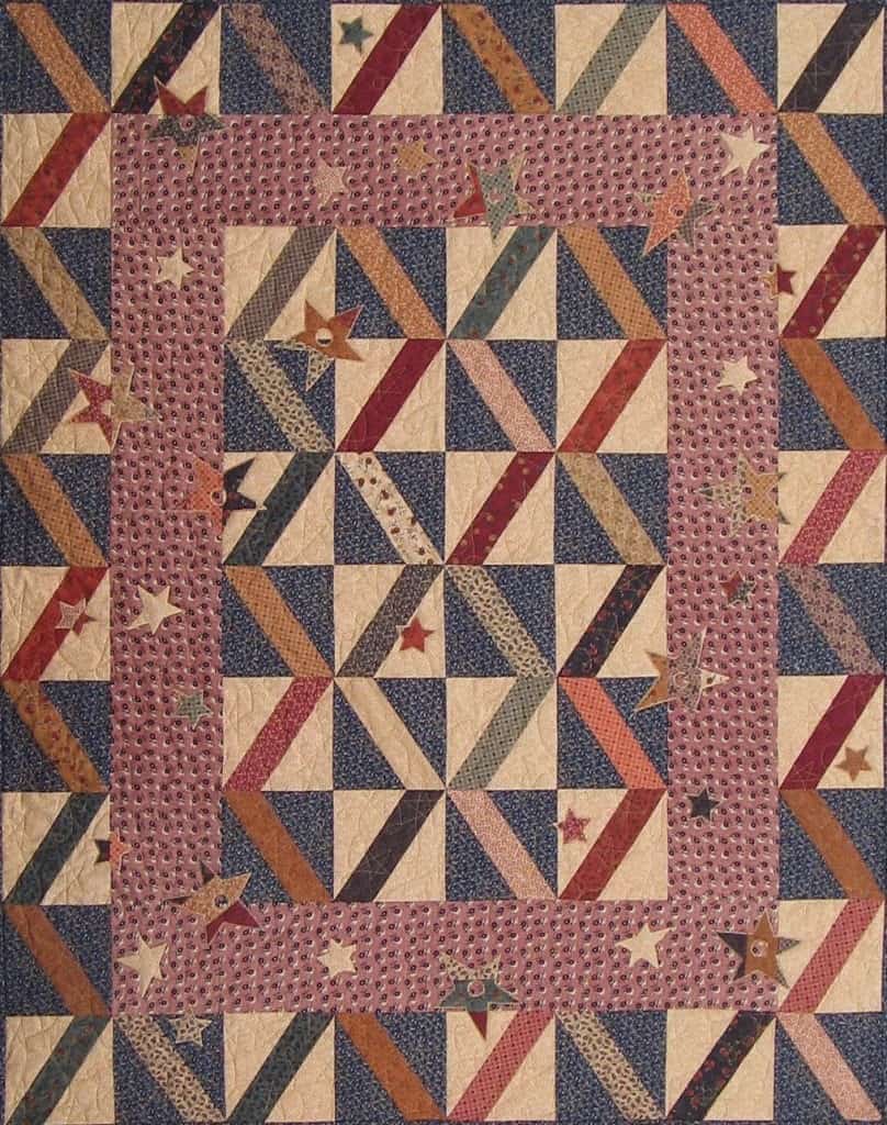Startdust quilt from 2 in 1 On A Roll jelly roll quilt pattern.
